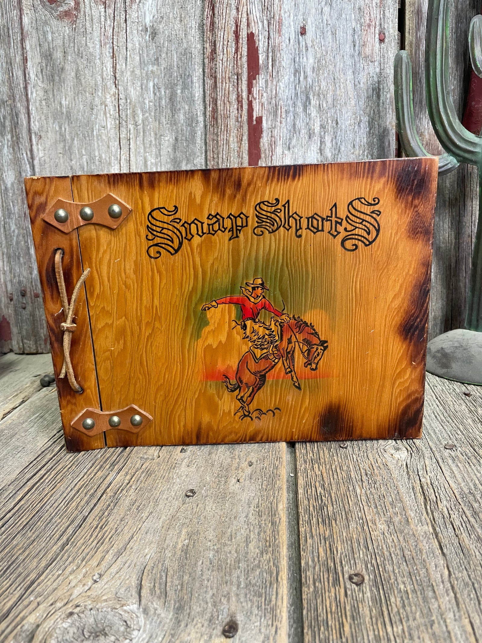 Snap Shots Bucking Bronc Photo Album