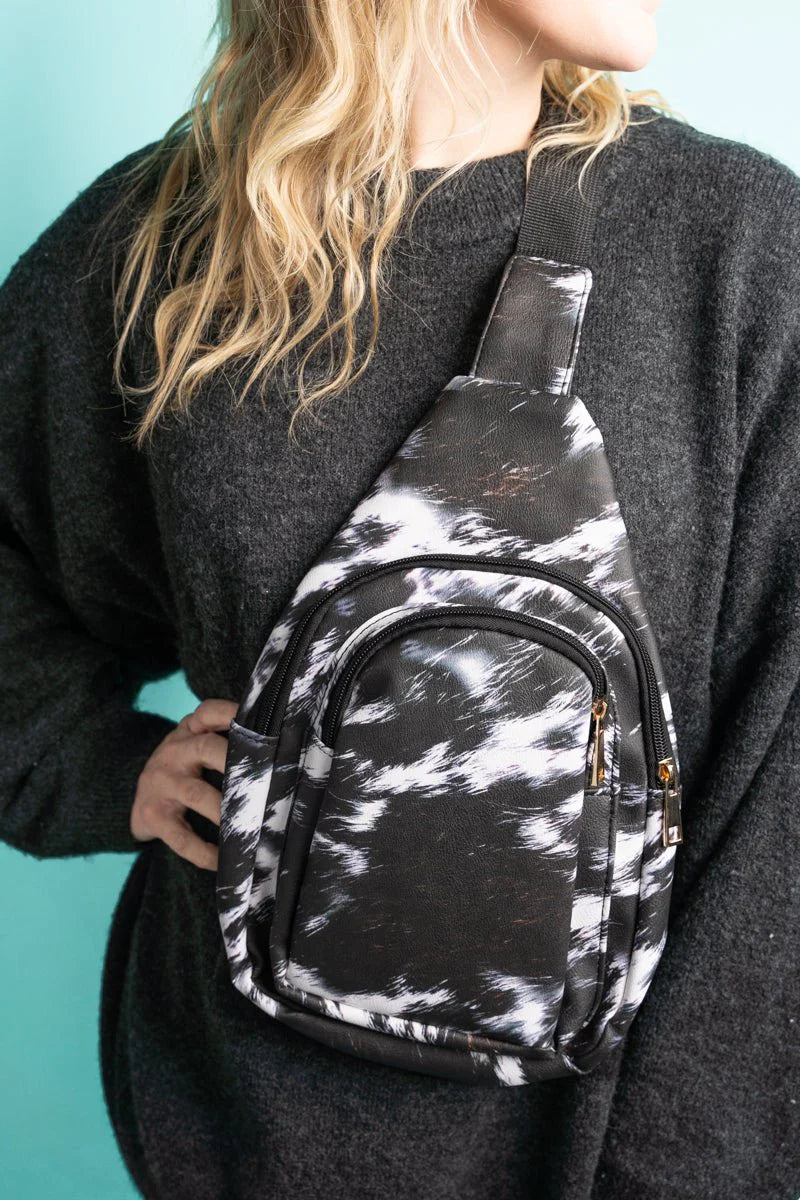 Black Cowhide Print Leatherette Sling Bag