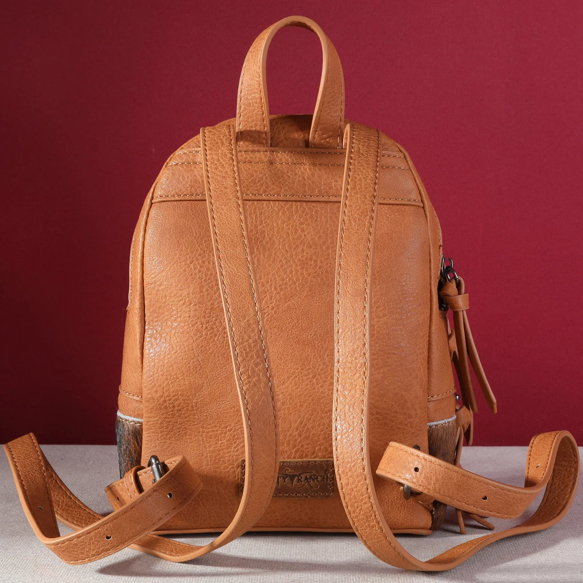 Trinity Ranch Cowhide Mini Backpack