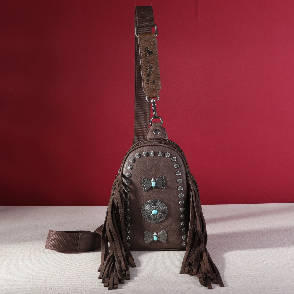 Fringe Mariposa Concho Sling Bag