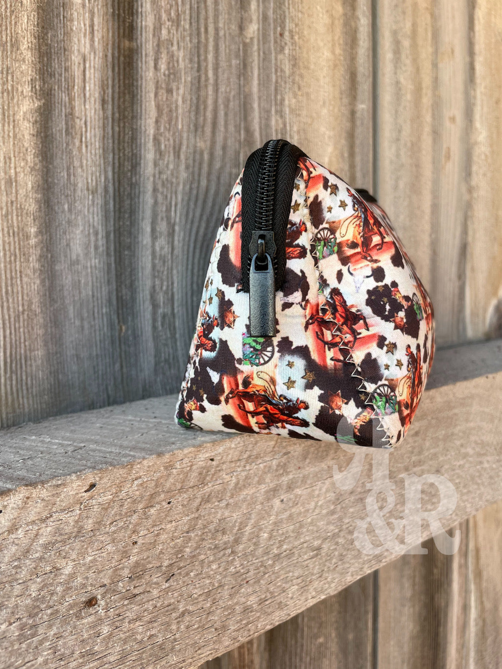 Cowhide Round Up Travel Bag